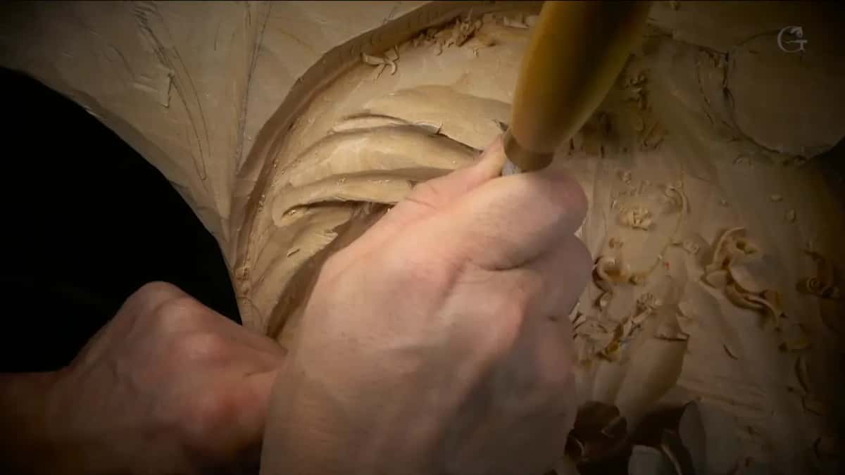 Fist around a pale handle
