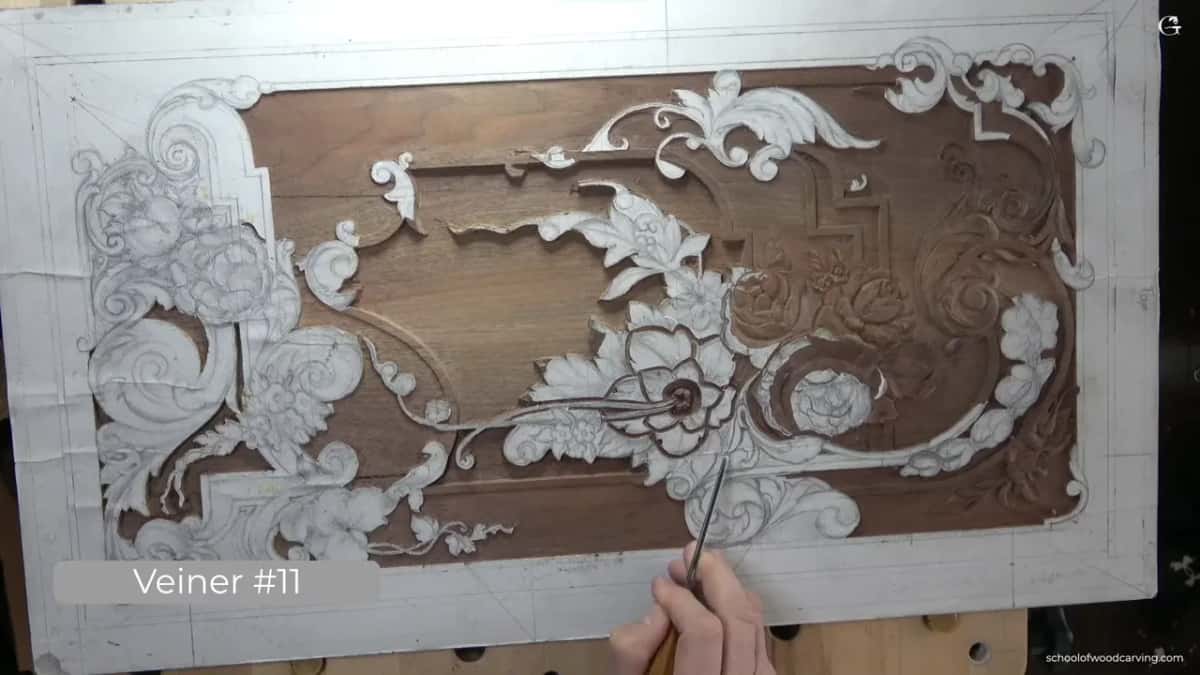 From straight above, with the Veiner #11 label at the lower left and the tool entering from the bottom