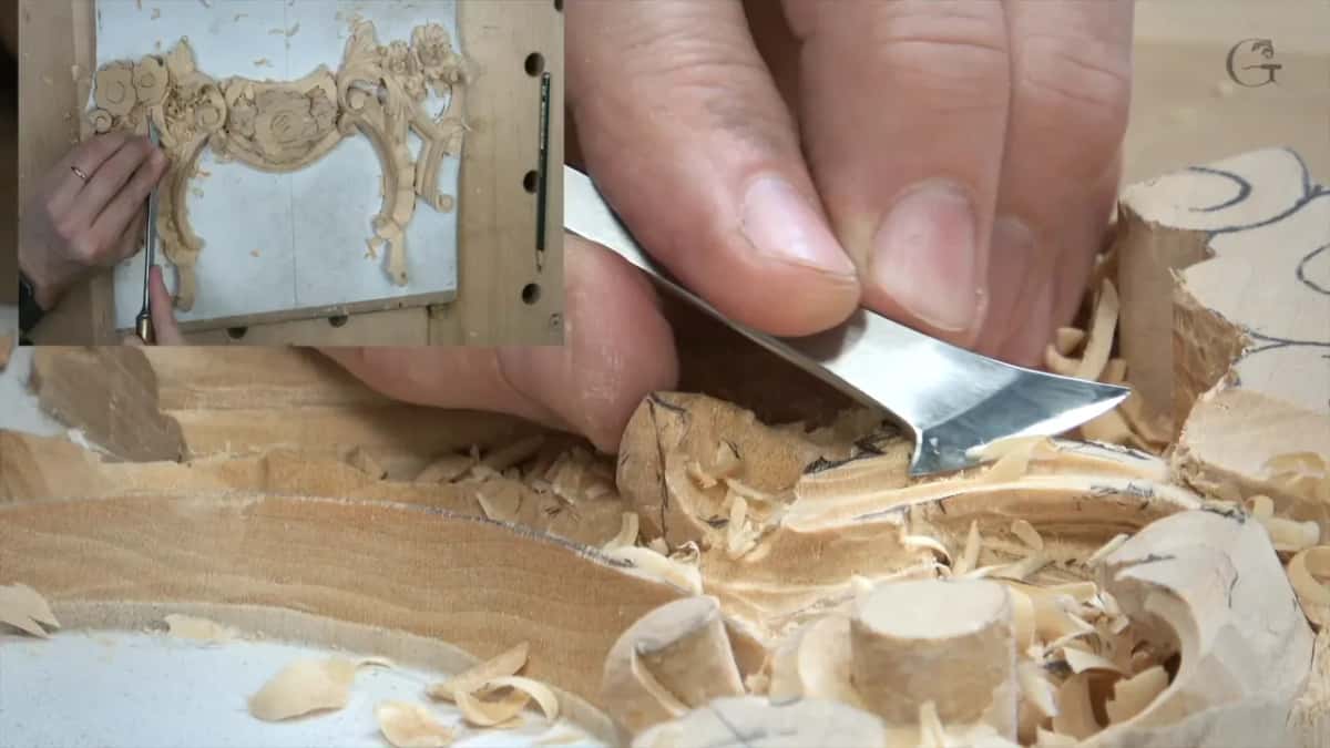 Flat curved blade shaving the top of a rounded ridge