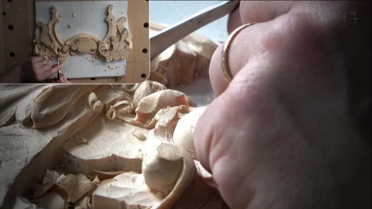 Ringed hand on a gouge among fresh curls
